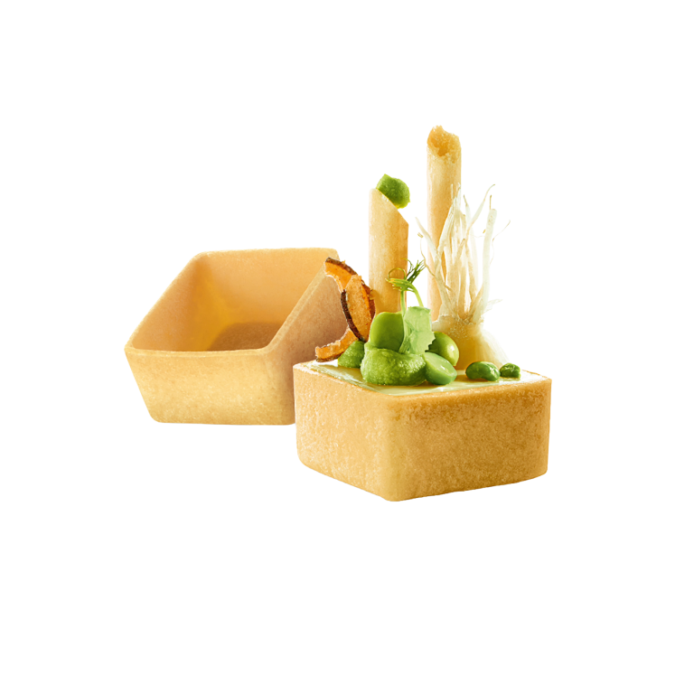 Kleine Tartelettes mit Gemüse und dekorativen essbaren Elementen.